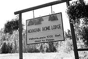 Moutain Home Lodge Sign: ''Welcome You're 1000 Feet Closer to Heaven''